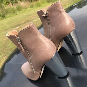 Size 9M, Lavender/Silver, Fairly New.